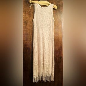 Gold full length shimmer dress with gold specs and fringe. Flapper style.
